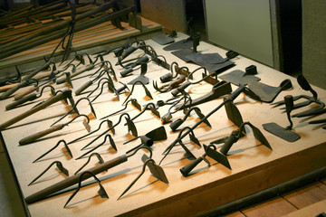 Old agricultural tools. A collection of ancient of damaged agricultural tools.