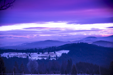 Fototapeta premium Winter clouds at the sunset