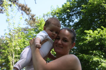 Fototapeta premium Happy mum with her baby