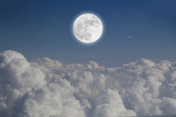 Naklejka na ściany i meble Romantic night. Full moon over cloudscape.
