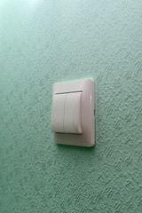 Electric switch on wall