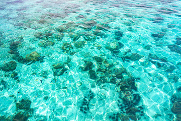 Abstract Aerial View of Transparent Blue Ocean Water Reflection Ripple with Many Fish and Shabby, Kanawa Island, Komodo National Park, Labuan Bajo, Indonesia