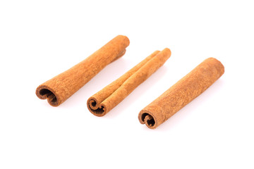 Cinnamon sticks on white background. Top view