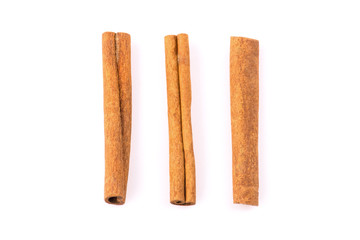 Cinnamon sticks on white background. Top view