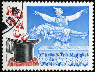 Magician in action on postage stamp of Monaco