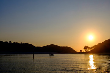 Fototapeta na wymiar Islas Cies, Vigo, Spain. Sunset over the island.
