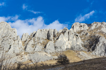 Mountains stone and white clouds