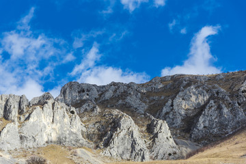 Mountains stone and white clouds