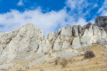 Mountains stone and white clouds