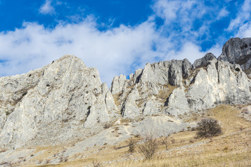 Mountains stone and white clouds