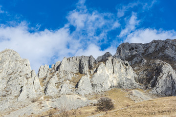 Mountains stone and white clouds
