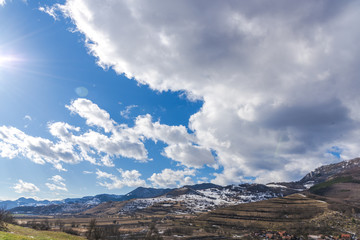 Mountains stone and white clouds
