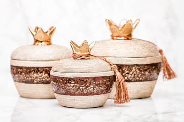 Decorative Ceramic Pomegranates on White Marble