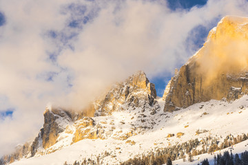 Clouds in the Dolomites Mountains in the cold winter
