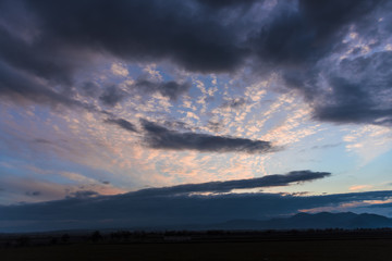 Obraz na płótnie Canvas Clouds at the sunset