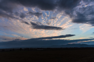 Obraz na płótnie Canvas Clouds at the sunset