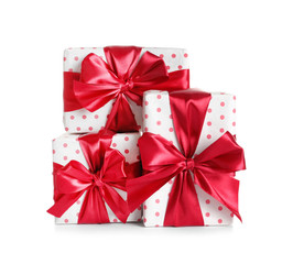 Beautifully wrapped gift boxes on white background