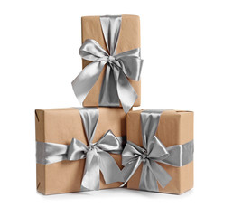 Beautifully wrapped gift boxes on white background
