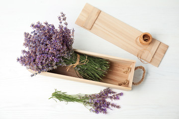Flat lay composition with lavender flowers on light background