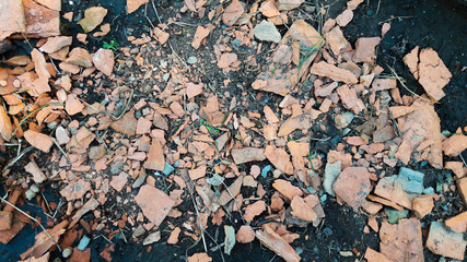 Background of bits of broken brick lying on the ground