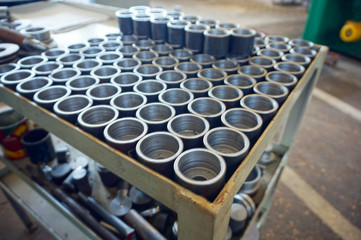 Metal parts after machining on a metal-cutting machine.