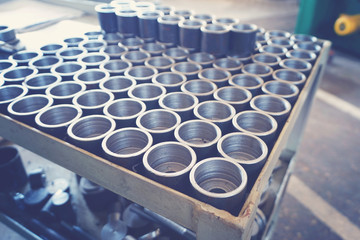 Metal parts after machining on a metal-cutting machine.