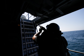 Romanian special forces marine boards ‘Regele Ferdinand’ frigate