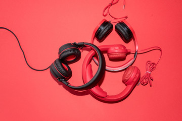 Headphones on pink background