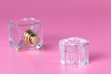 Few cosmetic bottle on pink background, mockup