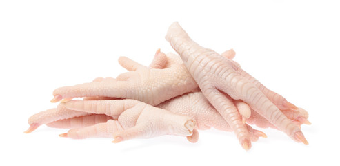 Raw chicken feet isolated on white background © cloud7days