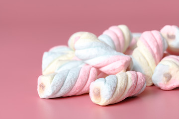 Twisted american marshmallow on pink background