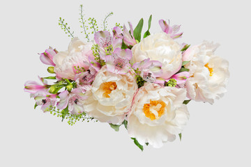 Obraz na płótnie Canvas Bouquet with light pink peonies and alstroemerias on a light background