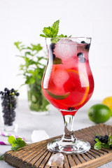 Fresh blueberry summer mojito cocktail. Blueberry lemonade or sangria on white