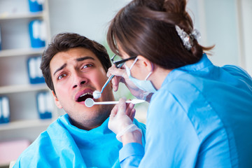 Patient afraid of dentist during doctor visit