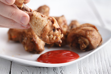 Grilled chicken legs with spices and garlic