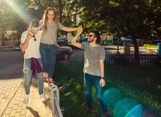 Group of friends having fun in down town. Young and careless concept.