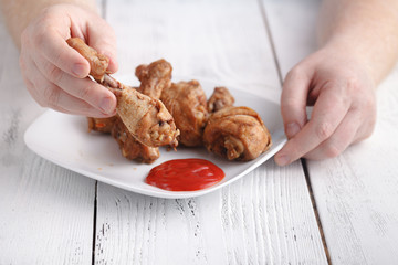 Grilled chicken legs with spices and garlic