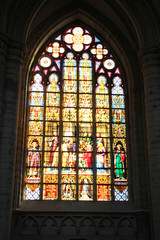 Colorful stained glass in cathedral of St. Michael and St. Gudula.