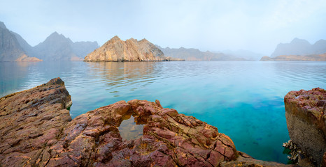 Sea tropical landscape with mountains and fjords, Oman