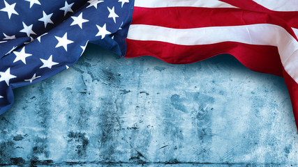 American flag on blue wall