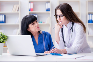 Senior patient visiting doctor for regular check-up