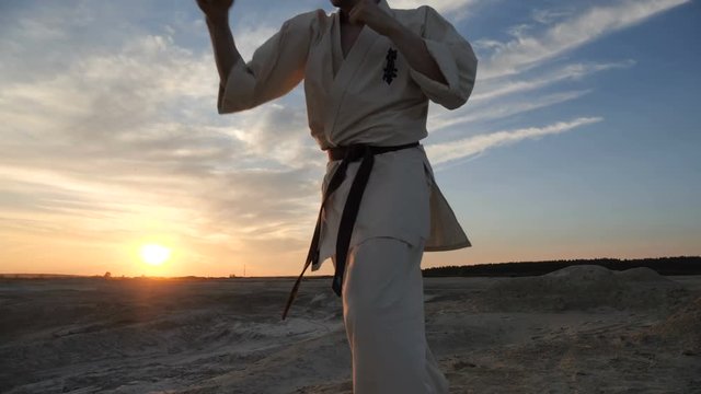 Movement of the camera around an athlete master martial arts