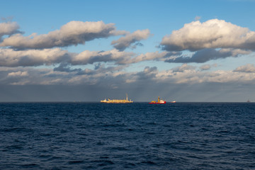Beautiful day in the oil towers and offshore oil rigs, beautiful clouds, sea and sky, MORE OPTIONS IN MY PORTFOLIO 