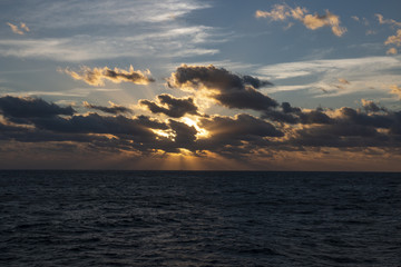 Naklejka na ściany i meble Wonderful sunset on the high seas, wonderful nature 