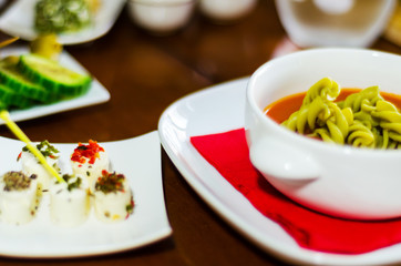 tasty and nutritious tomato soup with fresh pasta, dietary meal