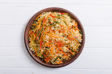 Asian noodles salad in bowl