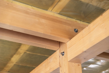 Fragment of the connection of the frame of the house. The device of the wooden house. The frame of the house. Home construction.