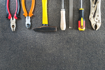 Different construction tools with Hand tools for home renovation on stone maintenance and reparing concept.Top view with place for text. © Sergey