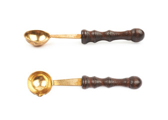 Wax melting spoon laddle isolated