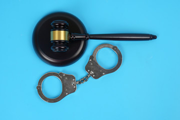 Judge gavel and handcuffs